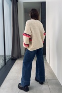 Beżowy sweter z kolorowymi frędzlami