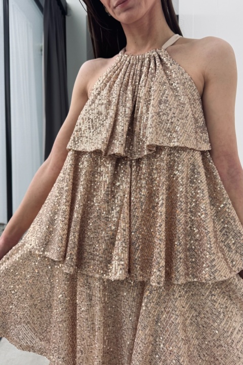 Zwiewna sukienka z cekinami, z kokardą z tyłu | złota